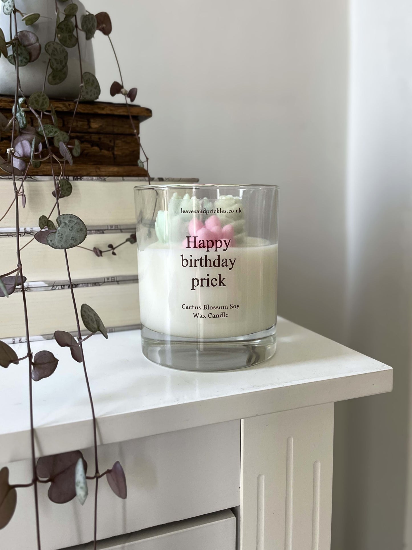 pink and green birthday terrarium candle in glass jar