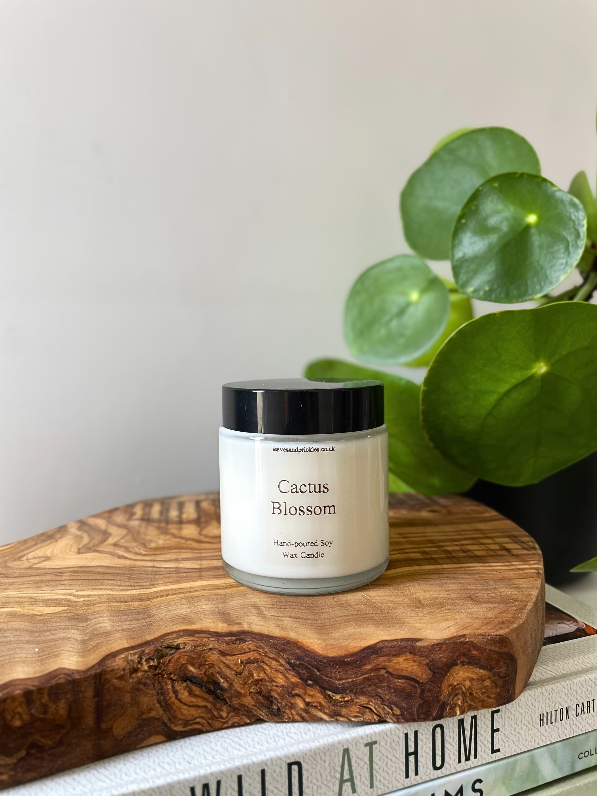 Cactus Blossom scented candle in a glass jar with a lid 
